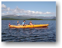 mathias, daniel und katrin in unserem boot auf dem see maisor