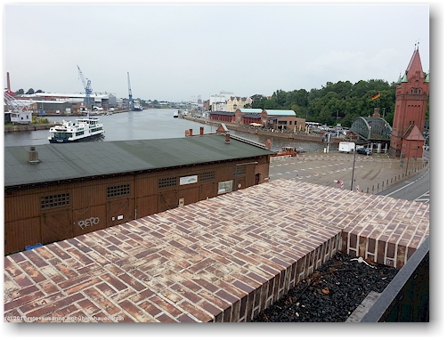 blick von der terrasse beim burgkloster auf der altstadtinsel von luebeck auf die trave sowie den burgtorhafen