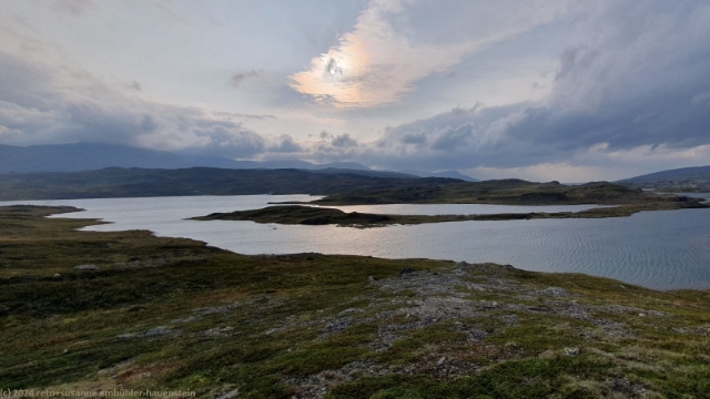 abendstimmung ueber dem tsiekkimjavrre bei den duottarstugorna